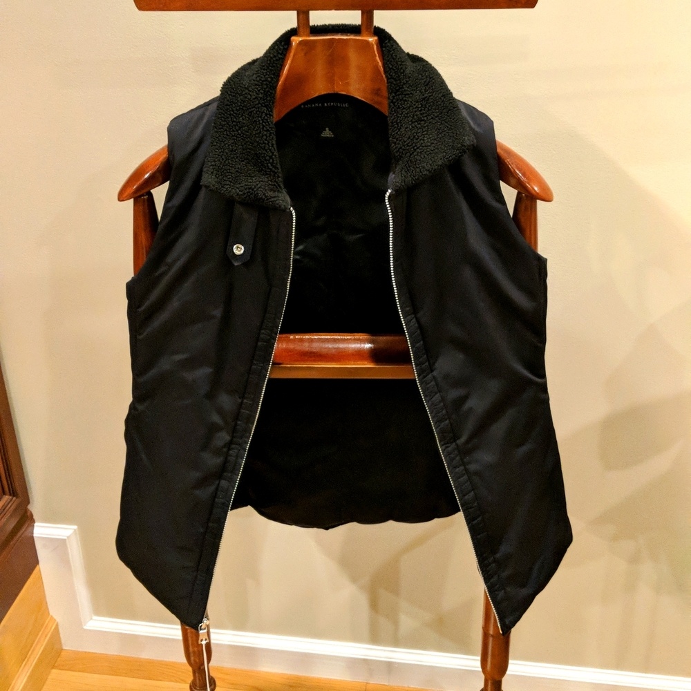 Banana Republic woman's black vest with fleece collar. Size S